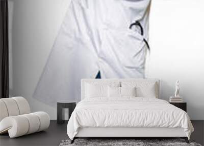 Middle age doctor men wearing medical coat smiling in love showing heart symbol and shape with hands. Romantic concept. Wall mural