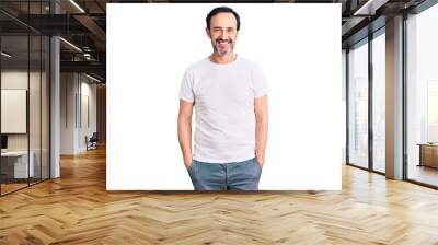 Middle age handsome man wearing casual t-shirt with a happy and cool smile on face. lucky person. Wall mural