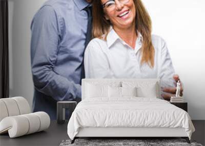 Middle age hispanic couple in love wearing glasses over isolated background happy face smiling with crossed arms looking at the camera. Positive person. Wall mural