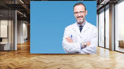 Middle age senior hoary professional man wearing white coat over isolated background happy face smiling with crossed arms looking at the camera. Positive person. Wall mural