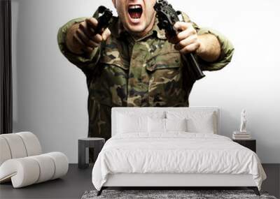 soldier aiming with two guns Wall mural