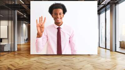 Young african american businessman wearing tie standing over isolated white background showing and pointing up with fingers number four while smiling confident and happy. Wall mural