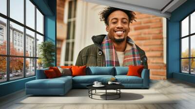 Young african american man smiling happy standing at the city Wall mural