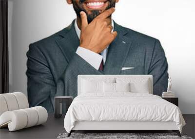 Young african american man wearing business clothes looking confident at the camera smiling with crossed arms and hand raised on chin. thinking positive. Wall mural