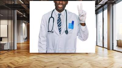 Young african american man wearing doctor uniform and stethoscope smiling with happy face winking at the camera doing victory sign. number two. Wall mural