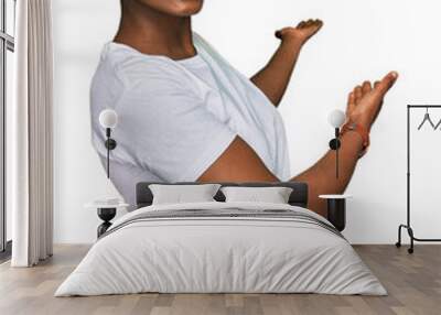 Young african american woman wearing casual white t shirt inviting to enter smiling natural with open hand Wall mural