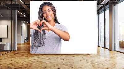 Young african american woman with braids wearing casual clothes smiling in love showing heart symbol and shape with hands. romantic concept. Wall mural