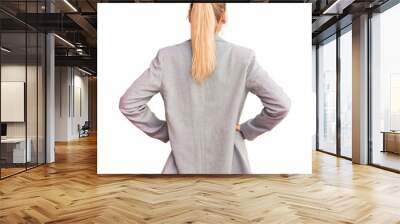 Young beautiful blonde woman wearing elegant jacket standing backwards looking away with arms on body Wall mural