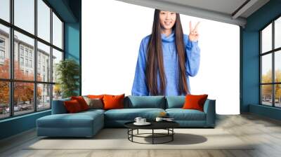 Young beautiful chinese woman wearing casual turtleneck sweater showing and pointing up with fingers number two while smiling confident and happy. Wall mural