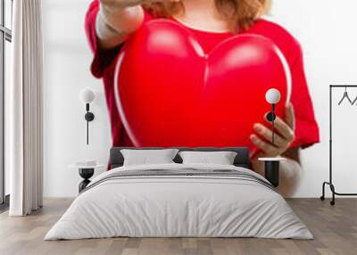 Young beautiful woman holding red heart in love over isolated background with open hand doing stop sign with serious and confident expression, defense gesture Wall mural