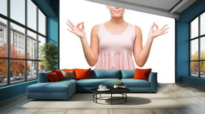 Young caucasian beautiful woman over isolated background relax and smiling with eyes closed doing meditation gesture with fingers. Yoga concept. Wall mural