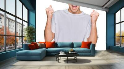 Young caucasian man wearing casual white t shirt celebrating surprised and amazed for success with arms raised and open eyes. winner concept. Wall mural