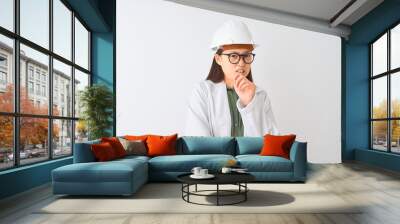 Young chinese engineer woman wearing coat helmet glasses over isolated white background disgusted expression, displeased and fearful doing disgust face because aversion reaction. With hands raised.  Wall mural