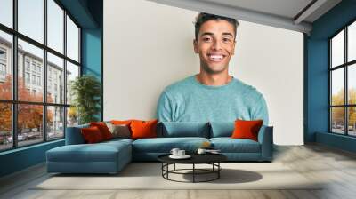 Young handsome african american man wearing casual clothes with a happy and cool smile on face. lucky person. Wall mural