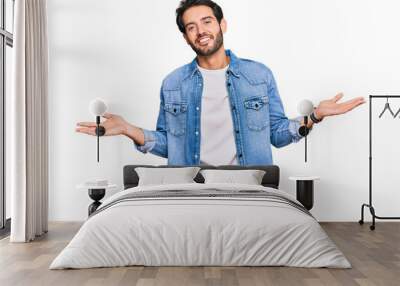 Young hispanic man wearing casual clothes smiling showing both hands open palms, presenting and advertising comparison and balance Wall mural