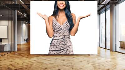 young hispanic woman doing gesture  Wall mural