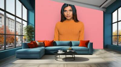 Young latin transsexual transgender woman wearing casual clothes depressed and worry for distress, crying angry and afraid. sad expression. Wall mural