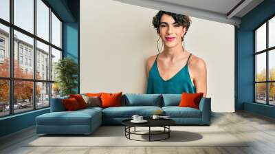 Young transgender man wearing make up and woman clothes, looking fashion and glamorous Wall mural