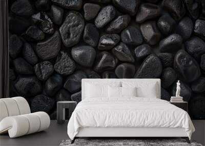 Close up of a pile of black rocks. Abstract black background  Wall mural