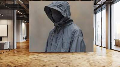 Man wearing a hooded jacket and a hoodie, creative portrait Wall mural