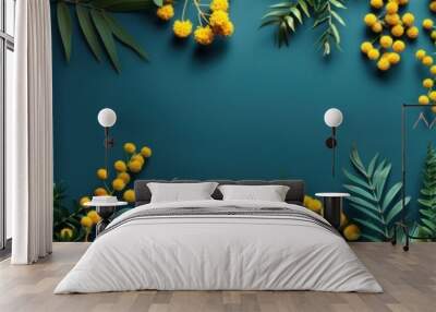 Yellow flowers and leaves are arranged around a blue background, plant background, banner, copy space Wall mural