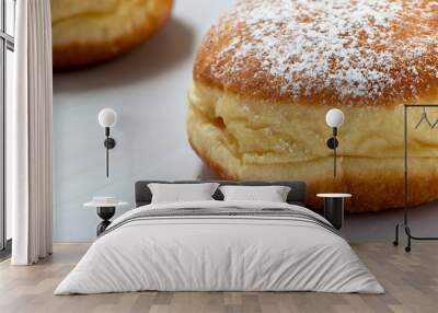 Two donuts in close-up, isolated on white marble backdrop. Filled with jam. Wall mural