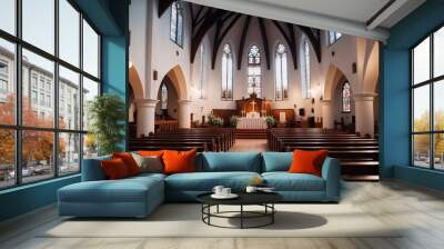 Brightly lit church interior with wooden pews and altar Wall mural