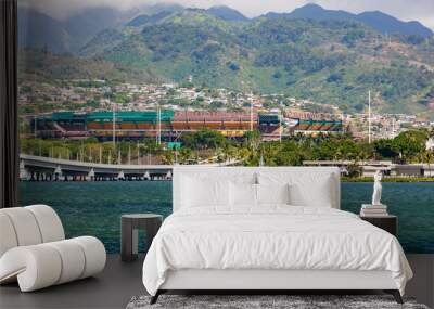 Pearl Harbor, Oahu, Hawaii, with Aloha sports stadium on a hill overlooking Wall mural