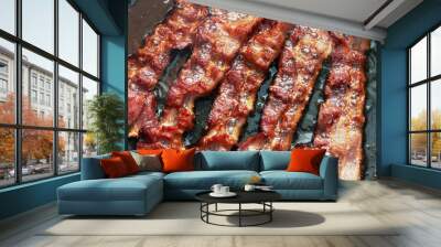 Bacon slice being cooked in frying pan Wall mural