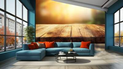 A close-up of a weathered wood table top against a blurry background of warm light. Wall mural