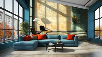 Two chairs and an ottoman stand in a minimalist room with large windows and sunlight streaming in. Wall mural