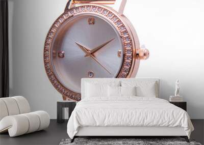 Wrist watch is gold and white color on white background. Wall mural