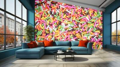 colorful rainbow sweet candies spreading pastry decoration backg Wall mural