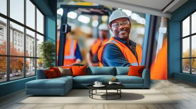 A logistics employee is operating a forklift truck in a busy warehouse. Wall mural