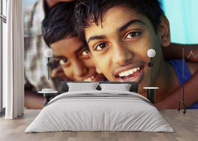 Happy teen boys looking at the camera. Wall mural