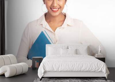 Young business woman looking at the camera with file on white. Wall mural