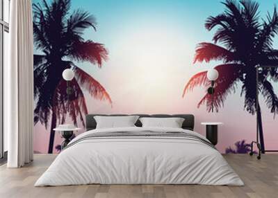 beautiful sunset on tropical palm tree silhouette background Wall mural