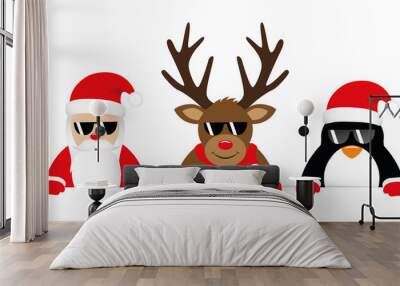 cute reindeer santa claus and penguin cartoon with sunglasses for christmas Wall mural