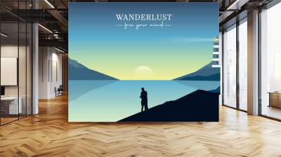 lovely couple on lighthouse seascape with mountain view at sunset Wall mural