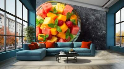 Colorful Fruit Salad in Glass Bowl Top View Wall mural