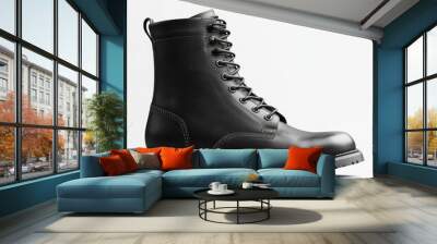 Black leather boot, soft leather, sturdy rubber sole, polished finish, laced-up design, stylish yet practical footwear choice. Wall mural