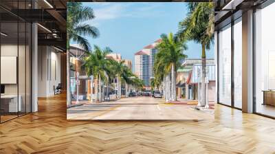 Fort Myers, USA - April 29, 2018: City town street during sunny day in Florida gulf of mexico coast for shopping and palm trees Wall mural