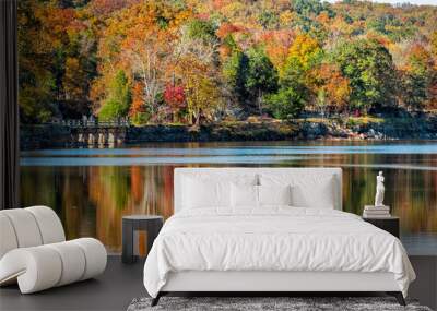 Great Falls trees reflection during autumn in Maryland colorful yellow orange leaves foliage by famous Billy Goat Trail people walking hiking on bridge Wall mural