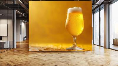 Glass of beer with foam on a yellow background, Close-up
 Wall mural