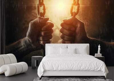 hands breaking free from heavy chains, liberation and overcoming adversity concept Wall mural