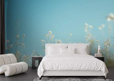 white grass flower under soft blue sky Wall mural