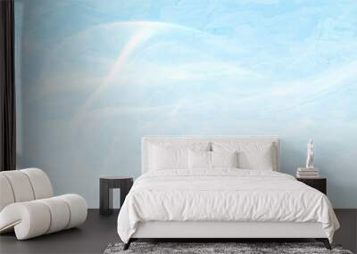 A clear blue sky with fluffy white clouds on a bright summer day Wall mural