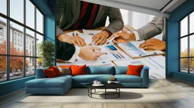 Investment analysis and consultation. Two fund managers discuss and analyze data to adjust investment portfolios. Wall mural