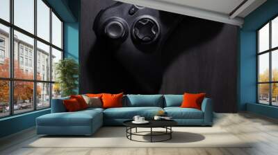 Joystick on wood background. Wall mural