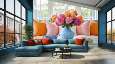 A cheerful living room with soft furniture, colorful cushions, and fresh flowers in elegant vases, creating a bright and inviting decor style. Wall mural